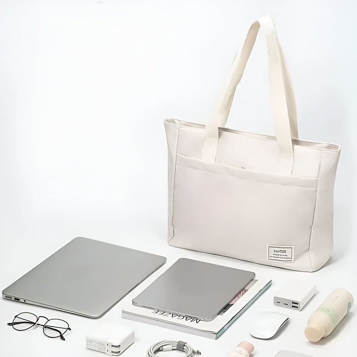 Sac cabas crème posé à côté d'un ordinateur, tablette, lunettes et accessoires., 46193955471584,46193955504352,46193955537120