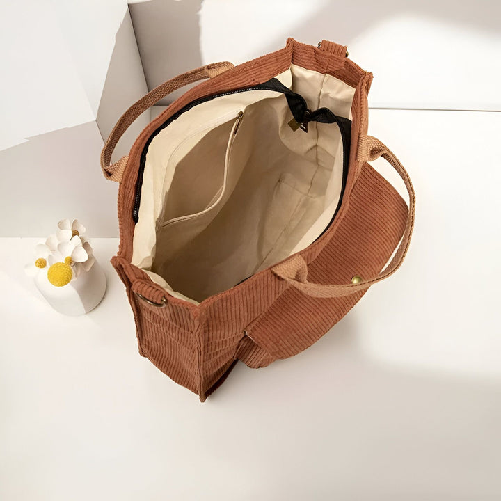 Sac cabas en velours côtelé marron ouvert avec intérieur visible et poche., 46193957503200,46193957535968,46193957568736,46193957601504