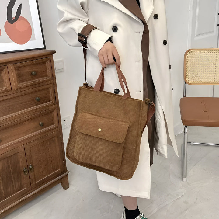 Sac en velours côtelé marron avec poche, porté à la main., 46193957503200,46193957535968,46193957568736,46193957601504
