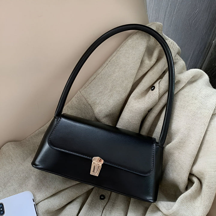 Sac baguette noir avec anse courte et fermoir doré., 46194027299040,46194027331808,46194027364576,46194027397344