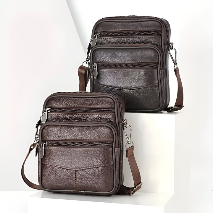 Deux sacs bandoulière en cuir marron avec multiples poches zippées., 46194067996896,46194068029664