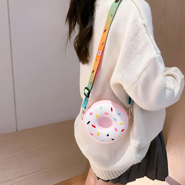 Sac rose en forme de donut avec vermicelles colorés et bandoulière colorée., 46193978802400,46193978835168,46193978867936,46193978900704