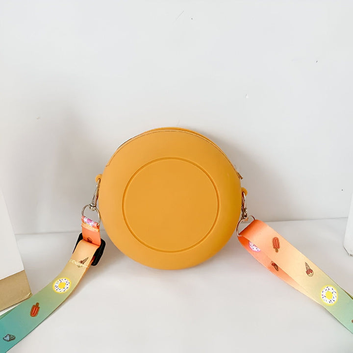 Sac rond jaune avec une bandoulière colorée à motifs de glace et donuts., 46193978802400,46193978835168,46193978867936,46193978900704