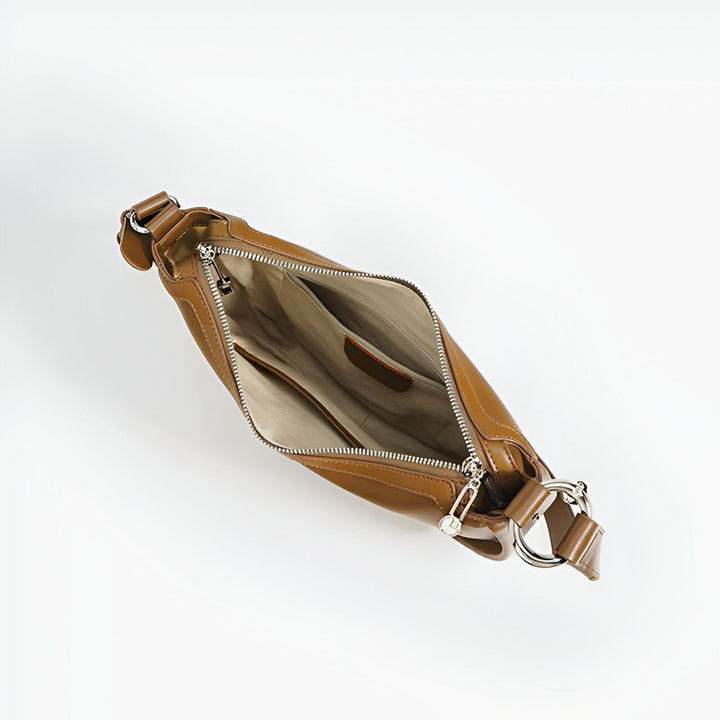 Sac à main en cuir marron ouvert sur l'intérieur, 46193853104352