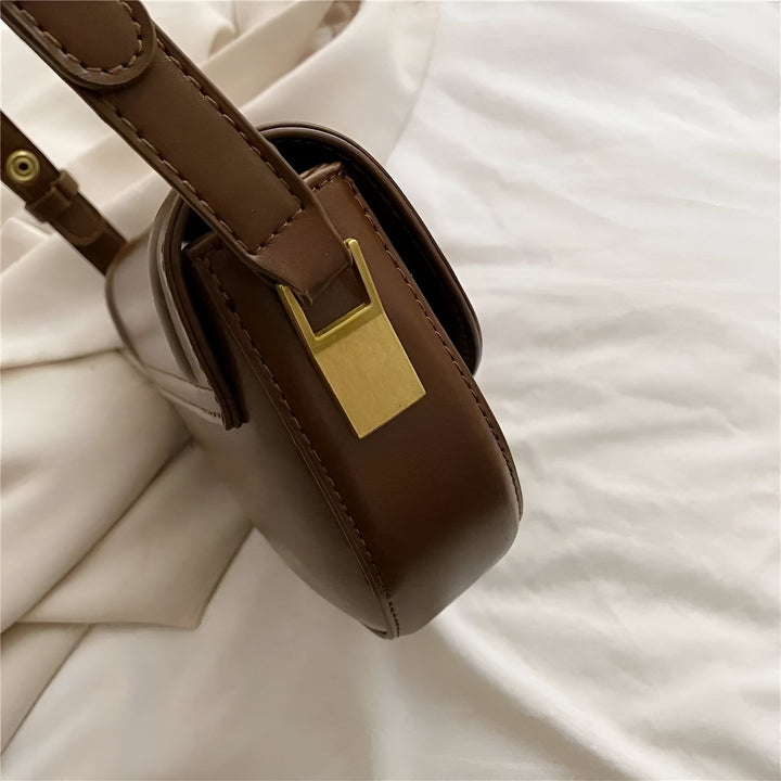 Sac en cuir marron avec fermoir doré., 46194026283232,46194026316000,46194026348768,46194026381536