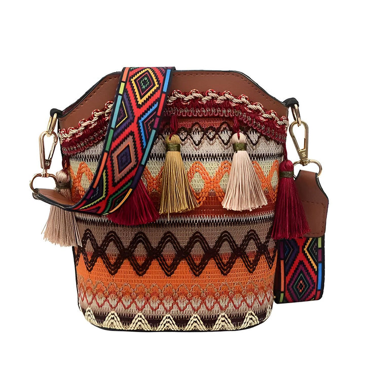 Sac à main marron avec motif tissé coloré, bandoulière géométrique et pompons décoratifs., 46193925193952,46193925226720,46193925259488,46193925292256