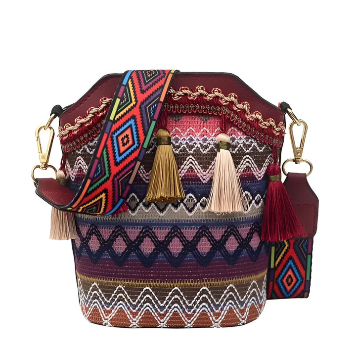 Sac seau bordeaux brodé avec motifs colorés, pompons et bandoulière multicolore., 46193925193952,46193925226720,46193925259488,46193925292256