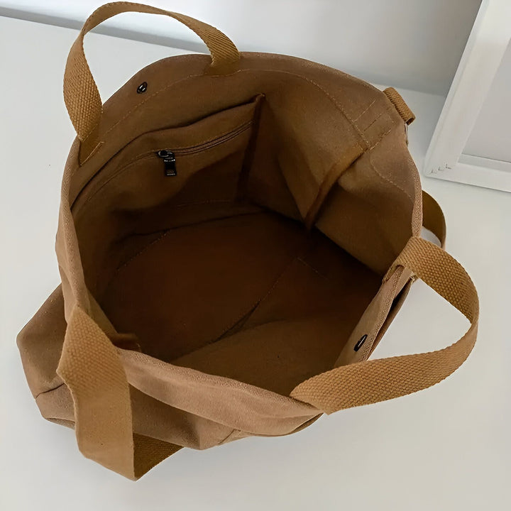 Sac cabas en toile marron ouvert, vue intérieure avec poche zippée., 46193896751328,46193896784096