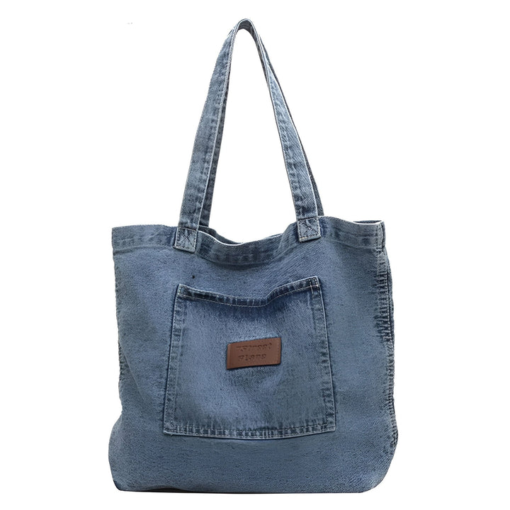 Sac tote bag en jean bleu avec poche avant et étiquette., 46193991942368,46193991975136