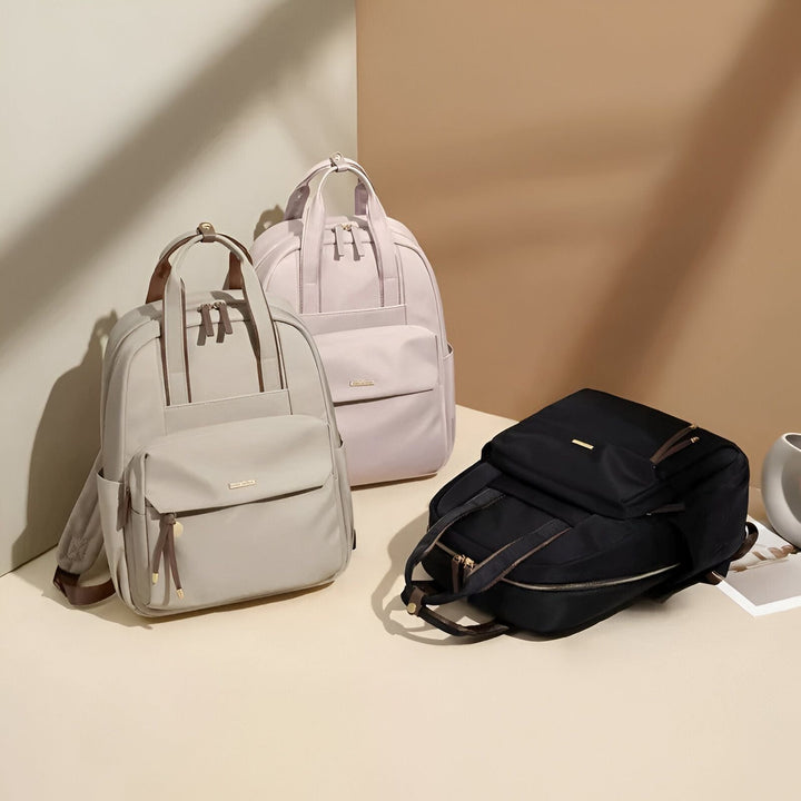 Trois sacs à dos modernes : gris clair, rose clair et noir., 46193875878112,46193875910880,46193875943648,46193875976416