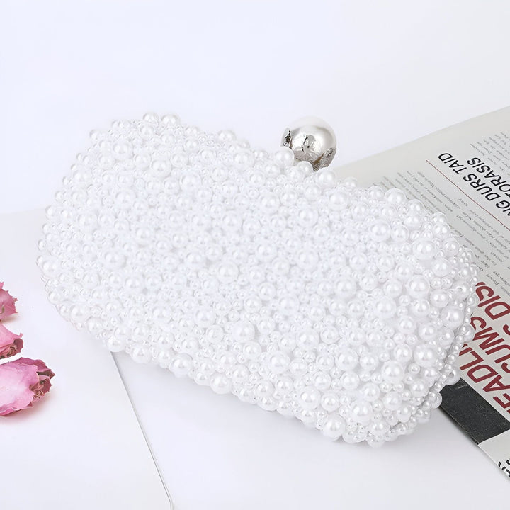 Sac pochette blanc orné de perles et d'un fermoir argenté, 46193928896736,46193928929504