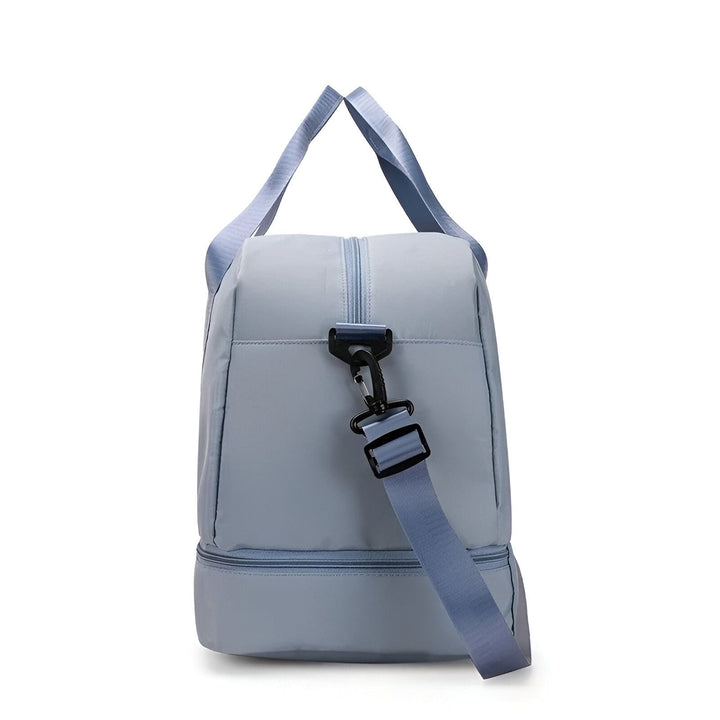 Sac de sport ou de voyage gris-bleu avec bretelle détachable, poignées et compartiment inférieur zippé., 46193918902496,46193918935264,46193918968032,46193919000800