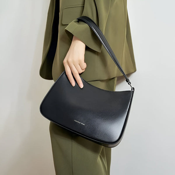 Sac à main noir minimaliste porté épaule, 46193861034208