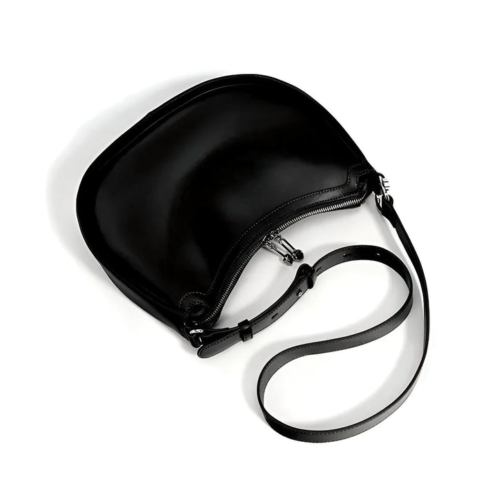 Sac à main noir brillant avec zip et bandoulière., 46193867751648