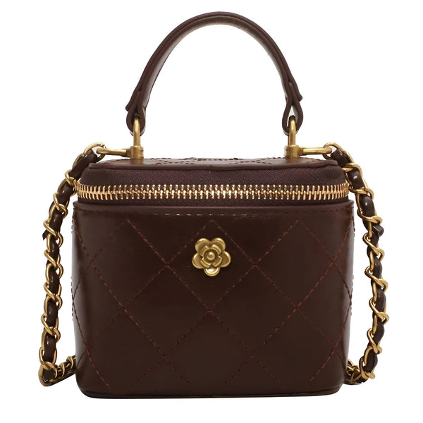Petit sac marron foncé matelassé, bandoulière chaîne dorée, poignée et détail fleur or., 46193974739168,46193974771936,46193974804704,46193974837472,46193974870240