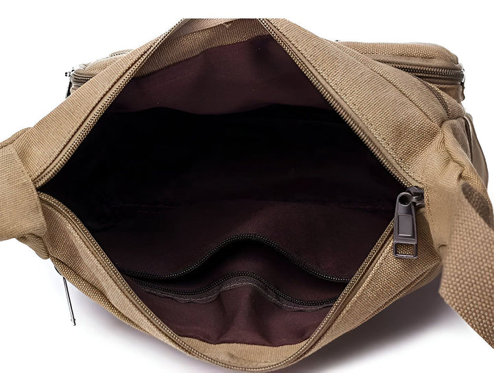 Intérieur d'un sac beige en toile ouvert, doublure foncée et poches zippées., 46194061148384,46194061181152,46194061213920,46194061246688,46194061279456