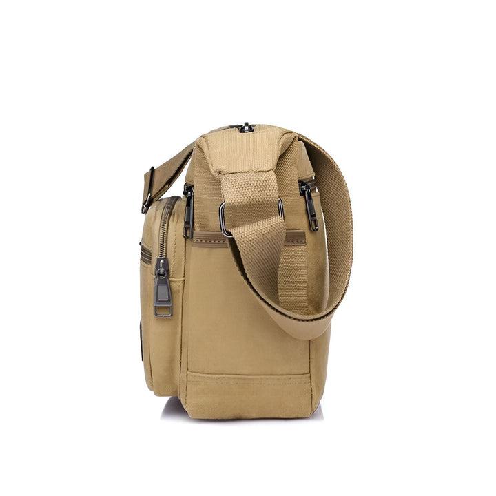 Sac bandoulière en toile beige avec sangle et poches zippées, vue latérale., 46194061148384,46194061181152,46194061213920,46194061246688,46194061279456
