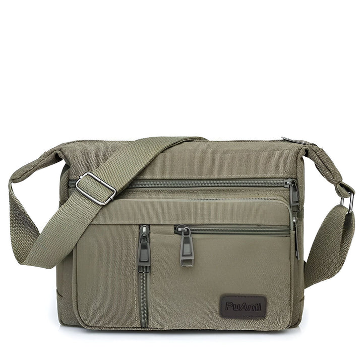 Sac bandoulière textile vert kaki avec plusieurs poches zippées et sangle ajustable., 46194061148384,46194061181152,46194061213920,46194061246688,46194061279456