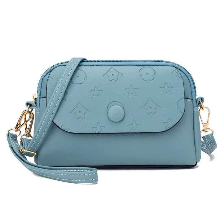 Sac à main bleu clair avec rabat à motifs floraux et géométriques, bandoulière et dragonne., 46262992503008,46262992535776,46262992568544,46262992601312,46262992634080,46262992666848,46262992699616